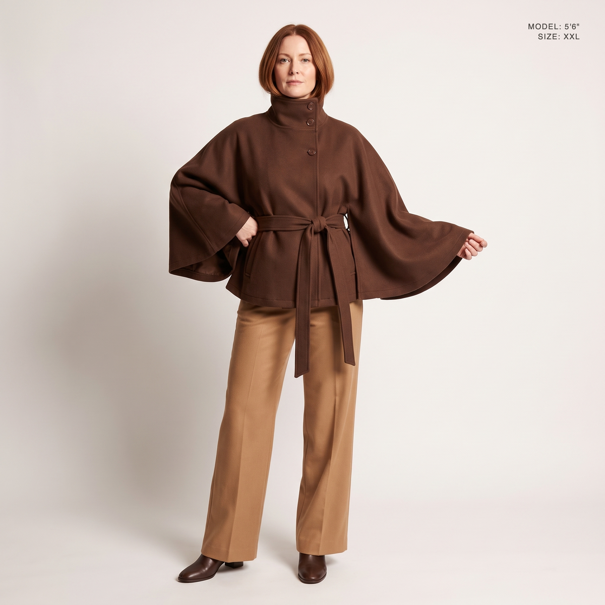 The Marlowe Cape Coat in Brown, front view, model 5 foot 6 wearing size XXL