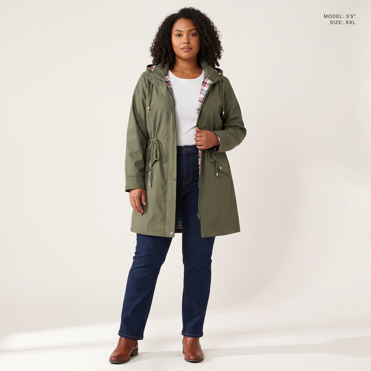 The Ashby Hooded Rain Trench in Army Green, worn open to show the plaid flannel lining, model 5 foot 5 wearing size XXL