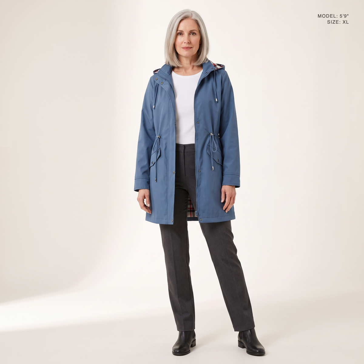 The Ashby Hooded Rain Trench in Blue, worn open to show the plaid flannel lining, model 5 foot 9 wearing size XL