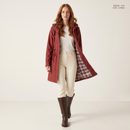 The Ashby Hooded Rain Trench in Wine Red, worn open to show the plaid flannel lining, model 5 foot 8 wearing size Large