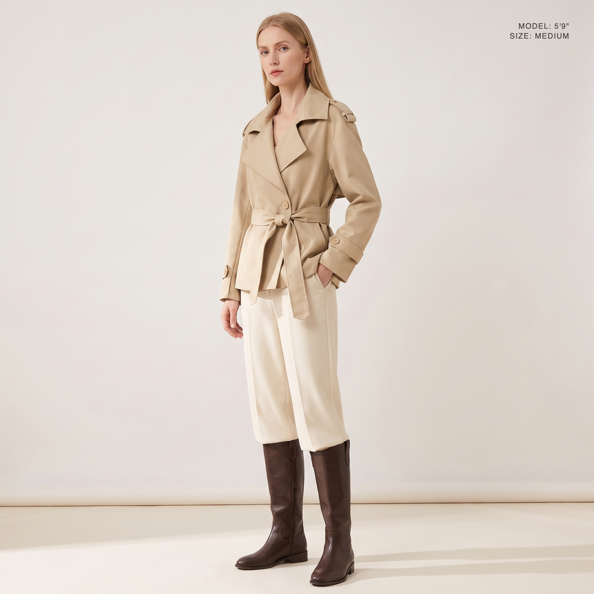 The Bexley Lapel Trench in Khaki, front view, model 5 foot 9 wearing size Medium