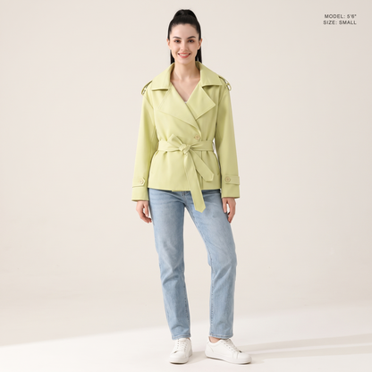 The Bexley Lapel Trench in Light Yellow Green, front view, model 5 foot 6 wearing size Small