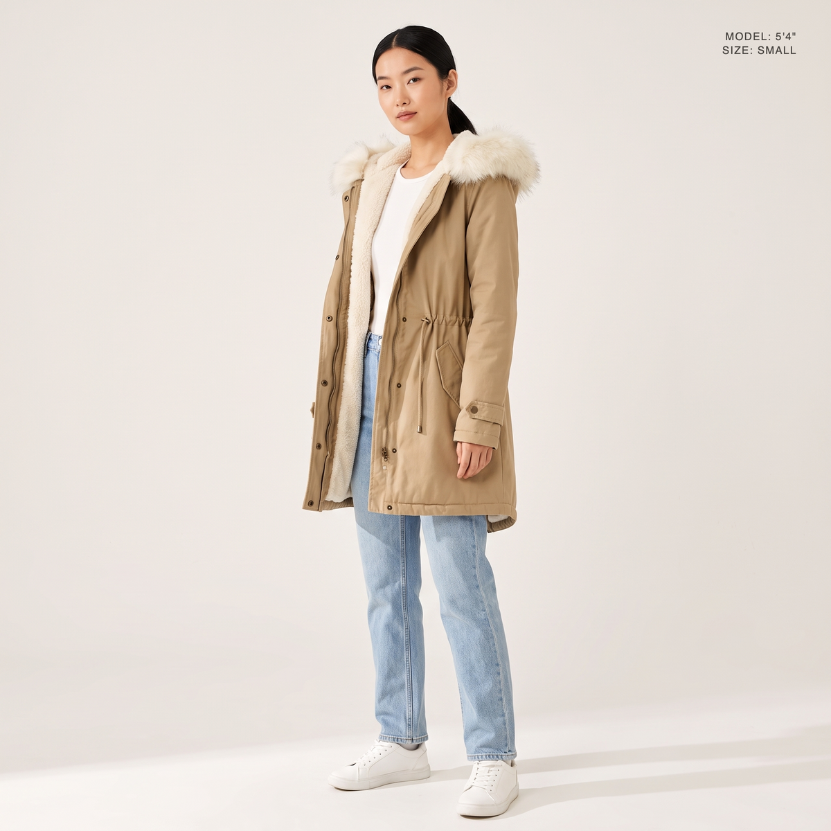 The Camden Sherpa Parka in Khaki, worn open to show the sherpa fleece lining, model 5 foot 4 wearing size Small