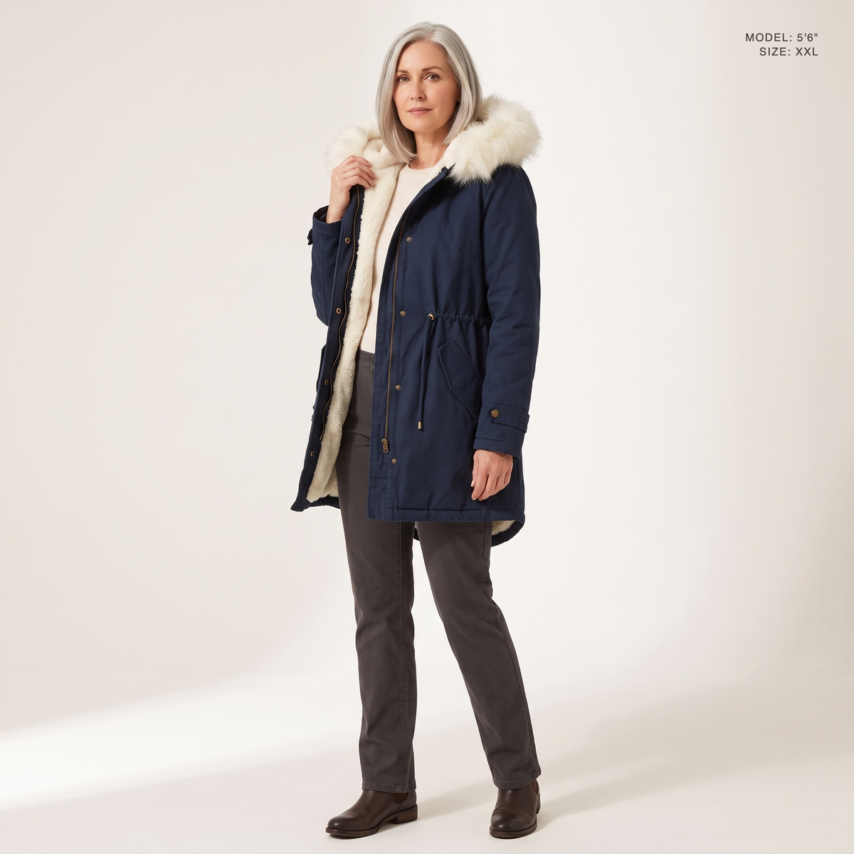 The Camden Sherpa Parka in Navy Blue, worn open to show the sherpa fleece lining, model 5 foot 6 wearing size XXL