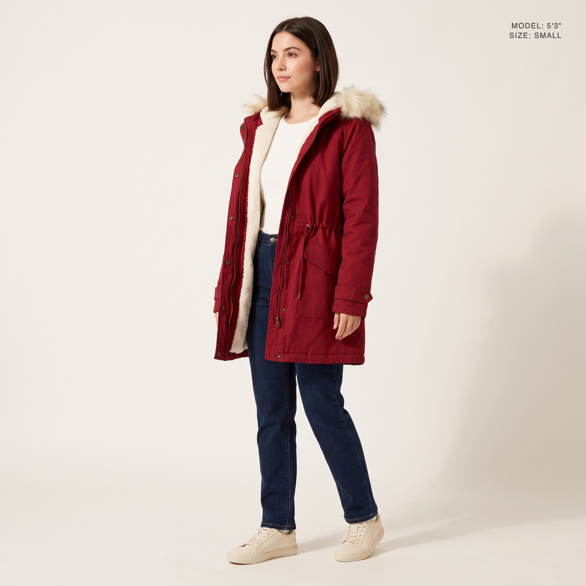 The Camden Sherpa Parka in Red, worn open to show the sherpa fleece lining, model 5 foot 3 wearing size Small