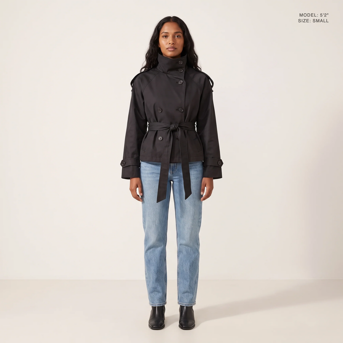 The Halston Cropped Trench in Black, front view, model 5 foot 2 wearing size Small