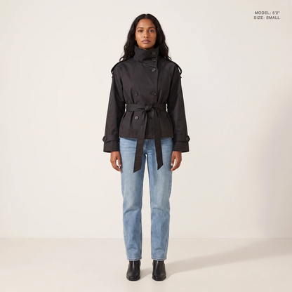 The Halston Cropped Trench in Black, front view, model 5 foot 2 wearing size Small
