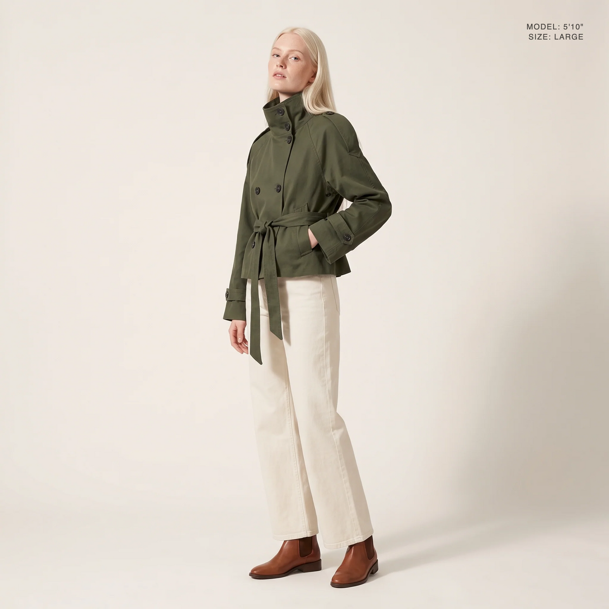 The Halston Cropped Trench in Army Green, front view, model 5 foot 10 wearing size Large