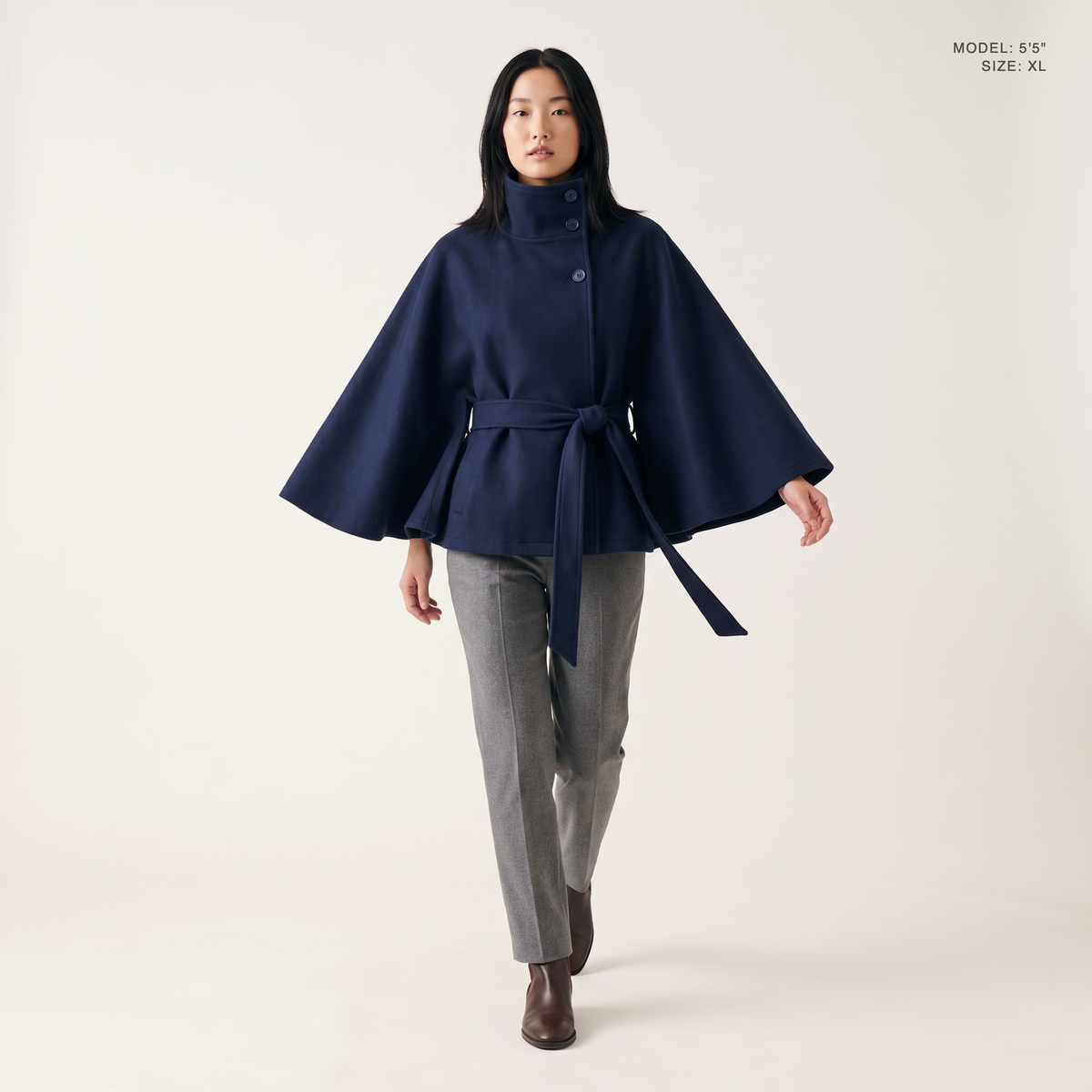The Marlowe Cape Coat in Navy Blue, front view, model 5 foot 5 wearing size XL